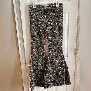 Cheetah print bell bottom pants.